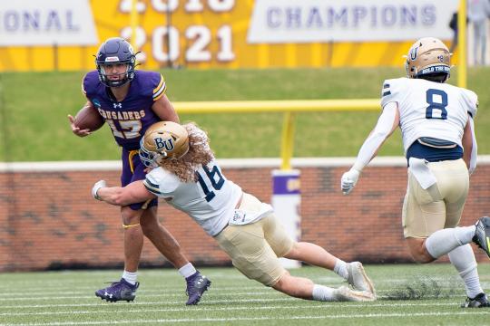 Senate Passes College Sports Bill That Caps Athlete Pay