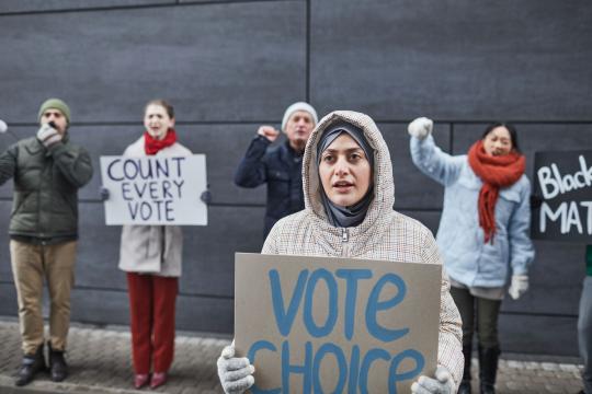NAACP Lawsuit Polling Places: Nine Groups Sue Over Armed Agents