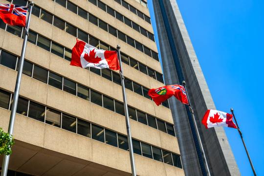 Stelco Layoffs Begin as Ottawa Threatens Court Fight